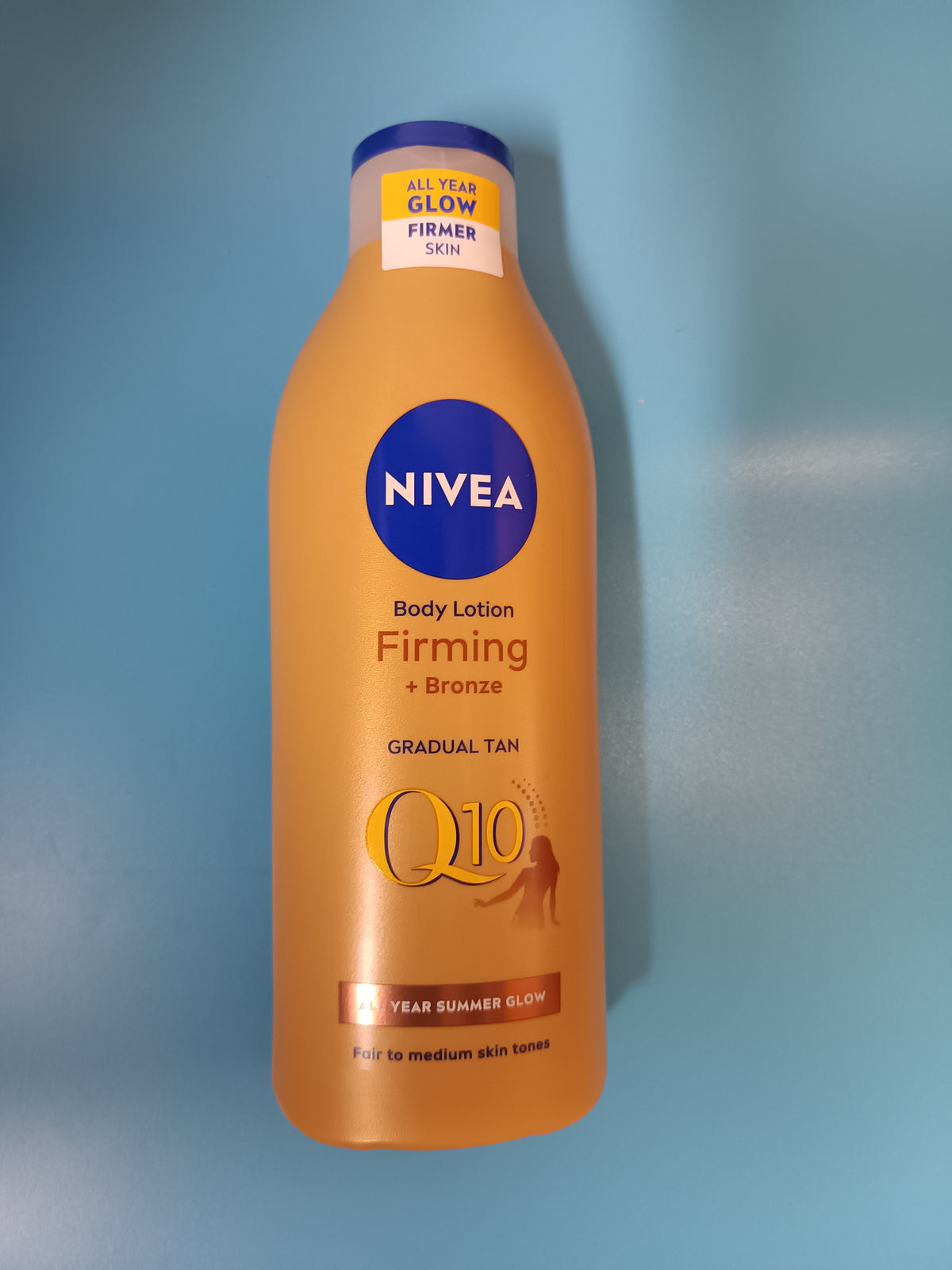 Nivea Body Lotion Firming Q10 + Bronze Gradual Tan, 400 ml — front