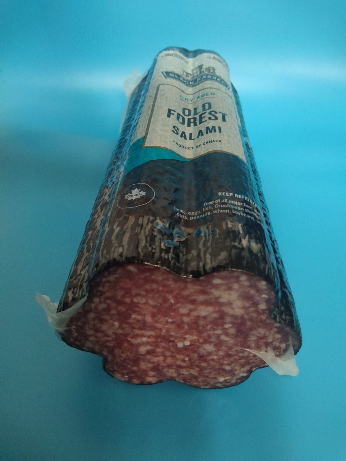 Black Kassel Old Forest Dry Aged Salami — the cut face